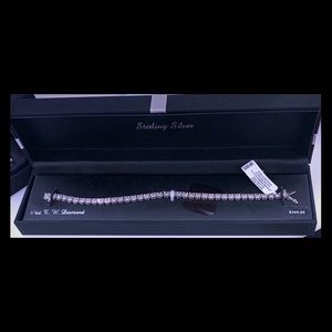 7 1/4th sterling silver 1/4K  diamond bracelet